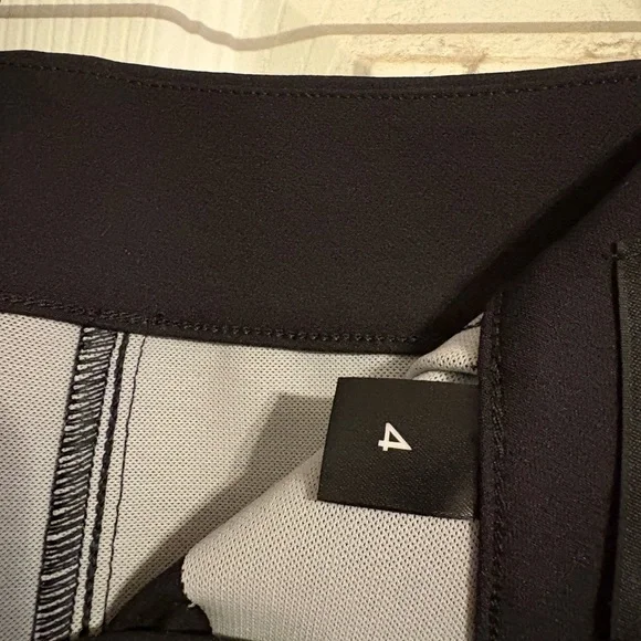Spanx the back zip women’s black pants. Zip at ankle and back at waist. Size 4 - Picture 4 of 6